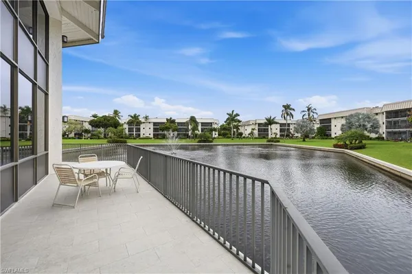 a view of swimming pool from a balcony