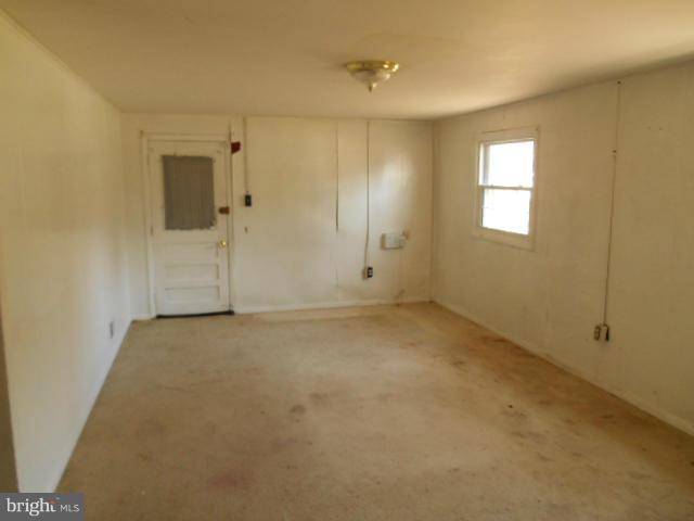 12718 Bushey Drive Silver Spring, MD 20906 - Photo 14 of 19 a view of an empty room with a window