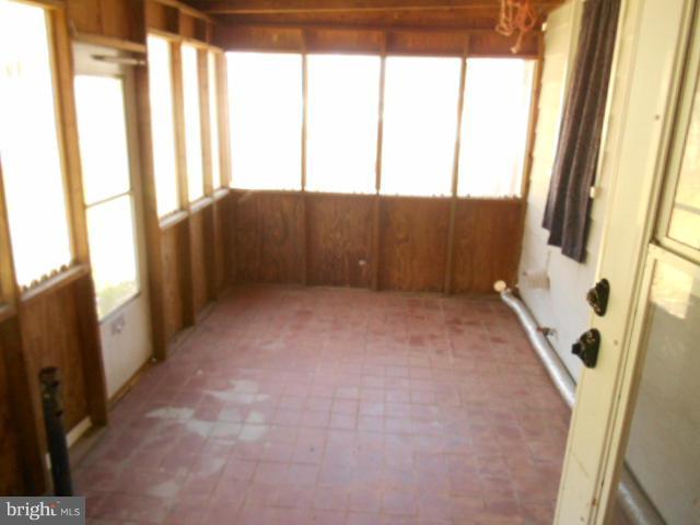 12718 Bushey Drive Silver Spring, MD 20906 - Photo 16 of 19 a view of an empty room with a window