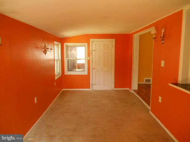 12718 Bushey Drive Silver Spring, MD 20906 - Photo 6 of 19 a view of an empty room with a window