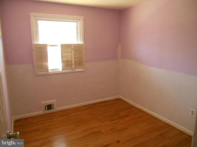 12718 Bushey Drive Silver Spring, MD 20906 - Photo 9 of 19 an empty room with a window