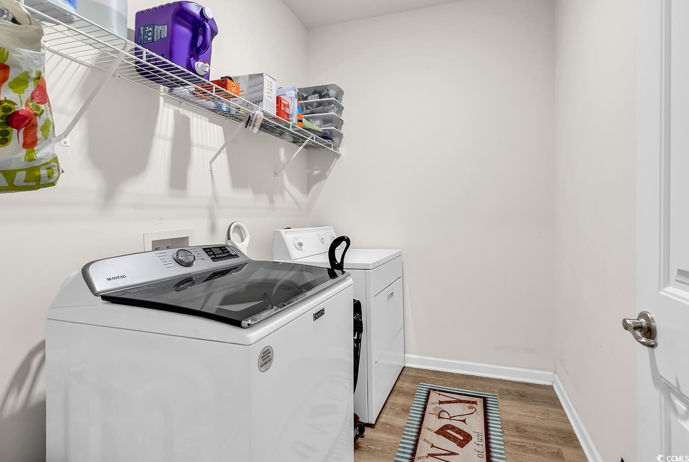 325 Cardita Loop Myrtle Beach, SC 29588 - Photo 12 of 39 Laundry room featuring washing machine and dryer a