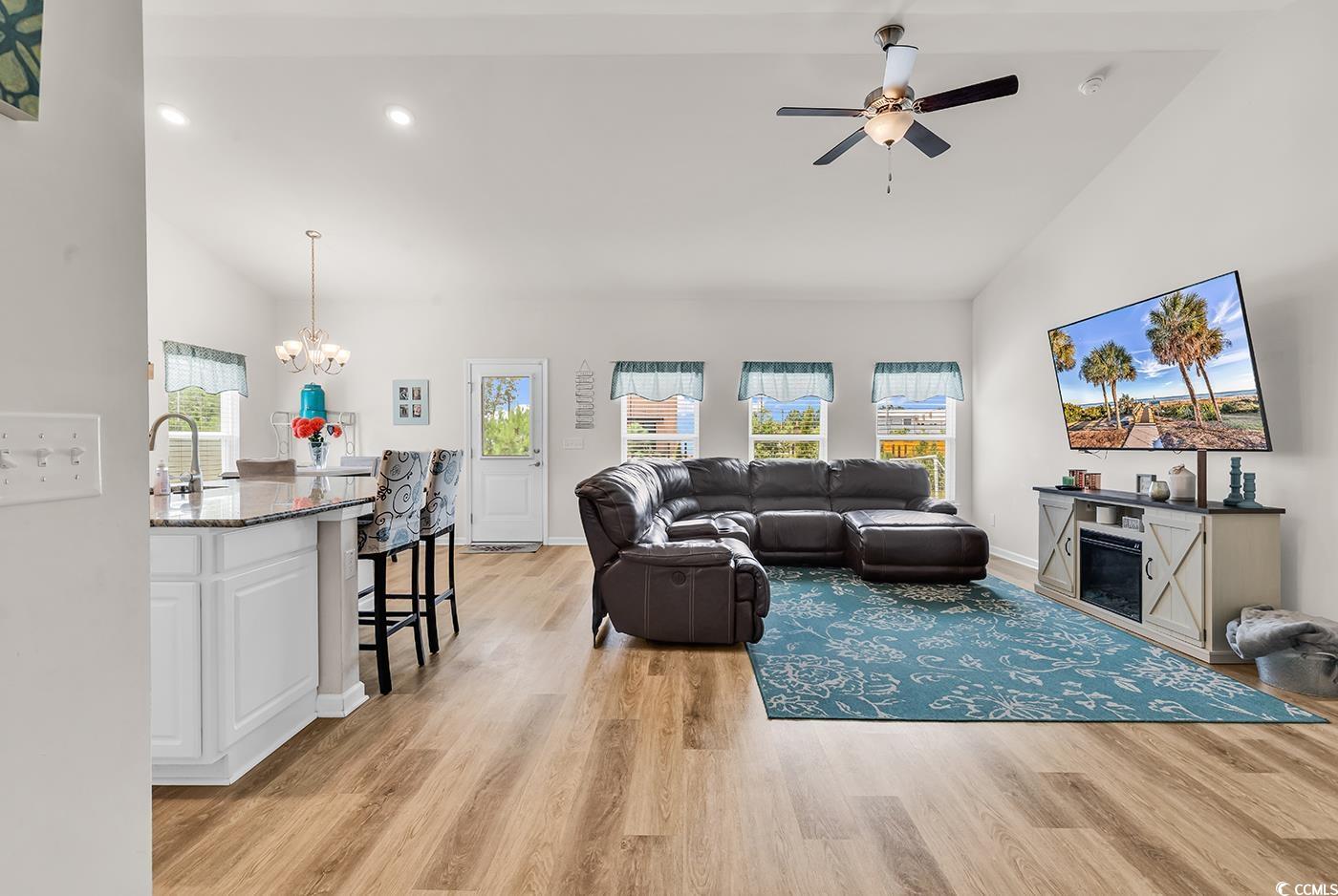 325 Cardita Loop Myrtle Beach, SC 29588 - Photo 18 of 39 Living area featuring light wood-style floors, hig