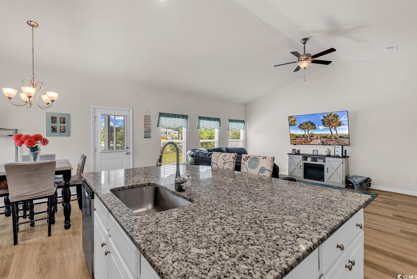 325 Cardita Loop Myrtle Beach, SC 29588 - Photo 39 of 39 Kitchen with open floor plan, light wood-style flo
