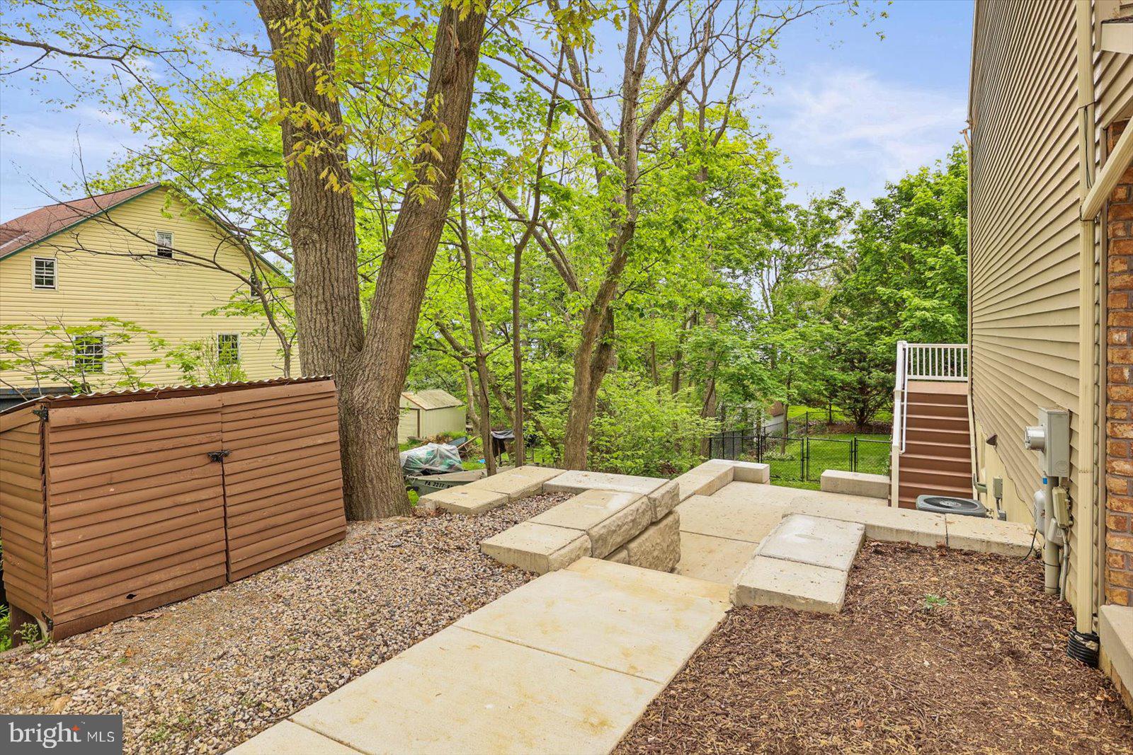 452 South Center Street Hanover, PA 17331 - Photo 32 of 45 Serene backyard retreat with greenery.