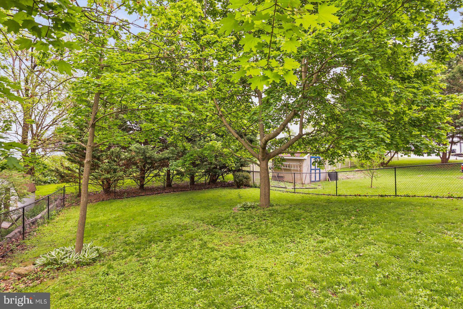 452 South Center Street Hanover, PA 17331 - Photo 41 of 45 Fenced area with shaded trees.