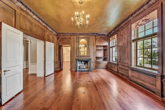 a kitchen with stainless steel appliances granite countertop a stove and a refrigerator
