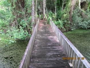 9701 Muller Road Fort Pierce, FL 34945 - Photo 18 of 19 Bridge Across Pond