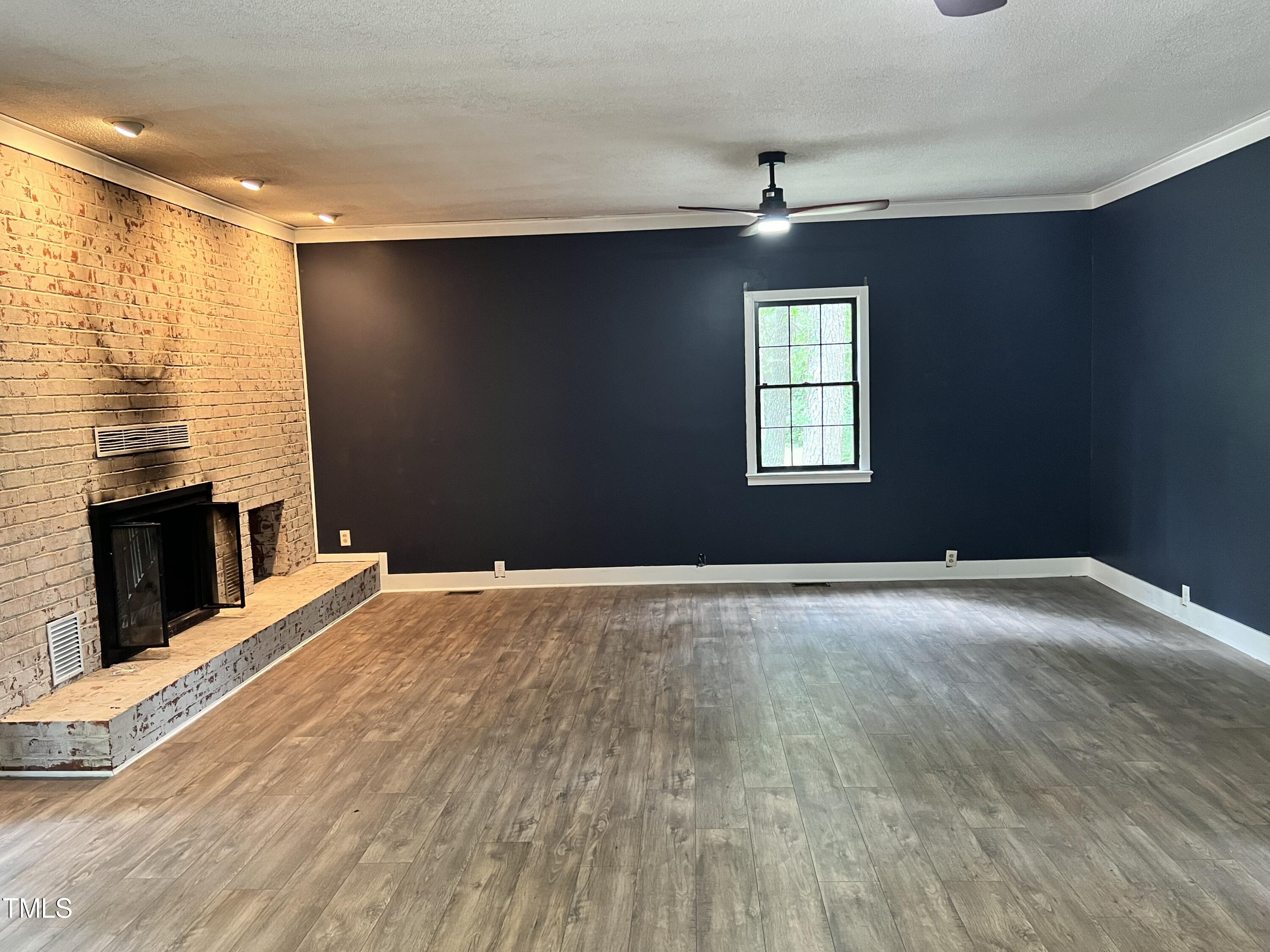 5759 Raleigh Road Benson, NC 27504 - Photo 11 of 21 Den Main Floor