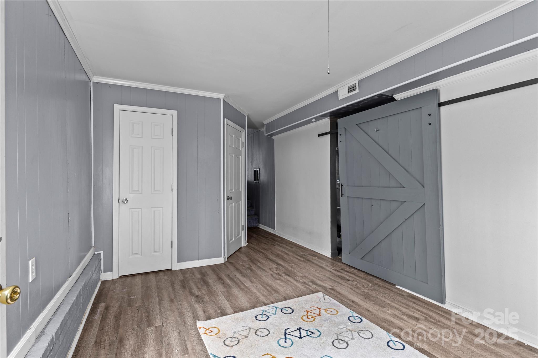 102 Wingate Drive Stanley, NC 28164 - Photo 19 of 37 a view of hallway with wooden floor