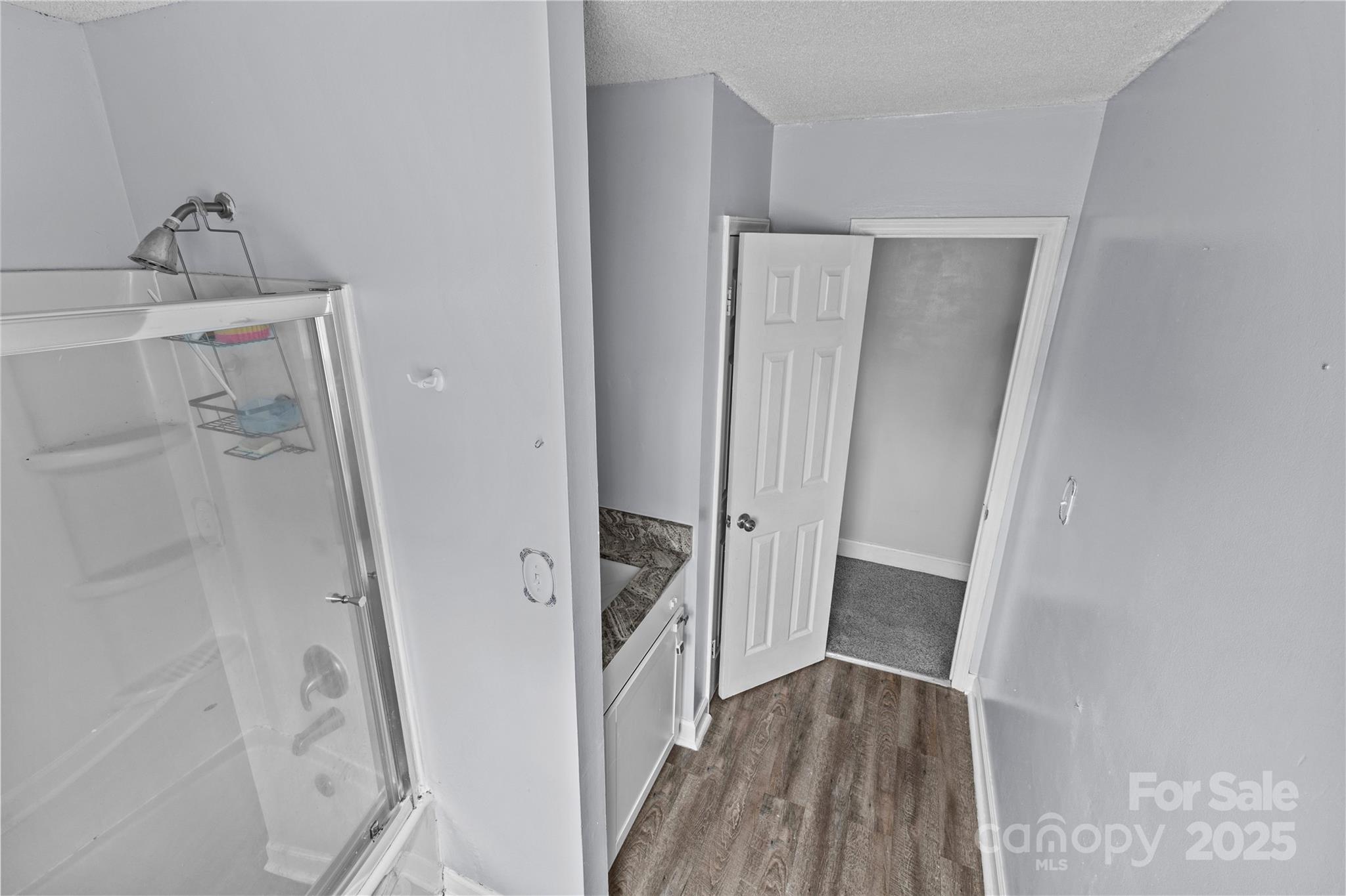 102 Wingate Drive Stanley, NC 28164 - Photo 34 of 37 a view of a hallway with wooden floor and staircase