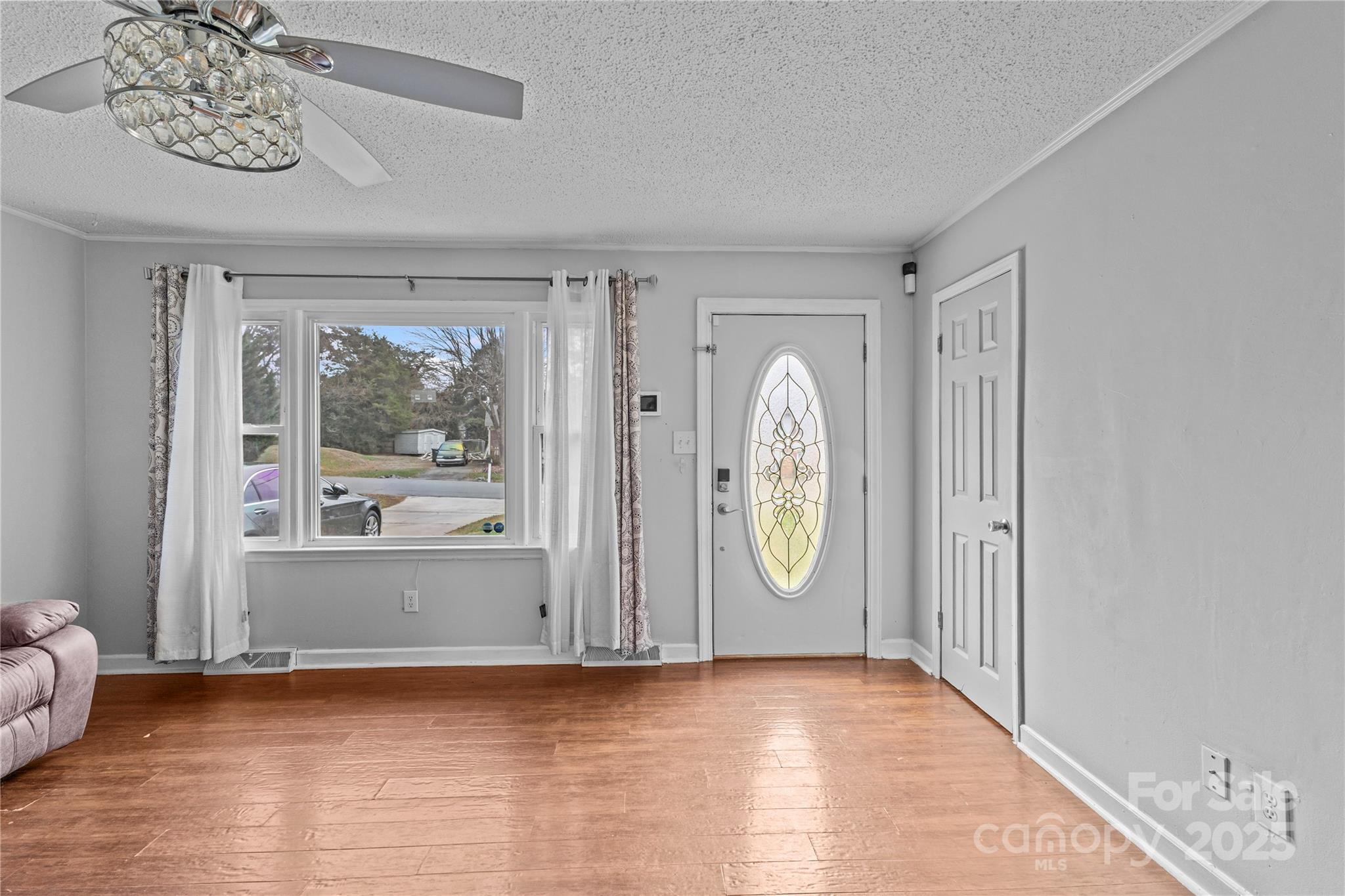 102 Wingate Drive Stanley, NC 28164 - Photo 6 of 37 a view of room with window and wooden floor