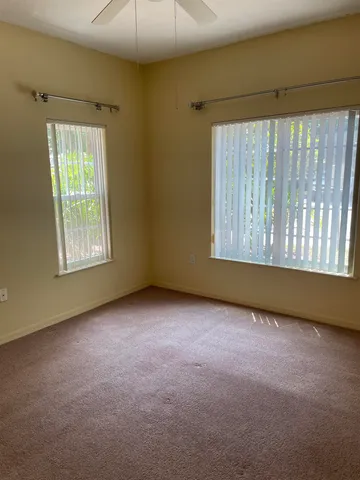 an empty room with windows