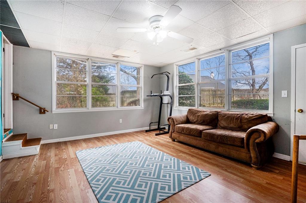 4034 Beaver Road Southwest Loganville, GA 30052 - Photo 11 of 24 a living room with furniture and a large window