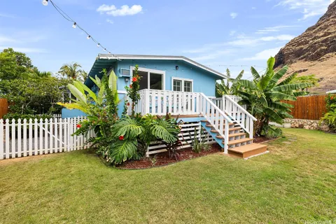 a house view with a garden space