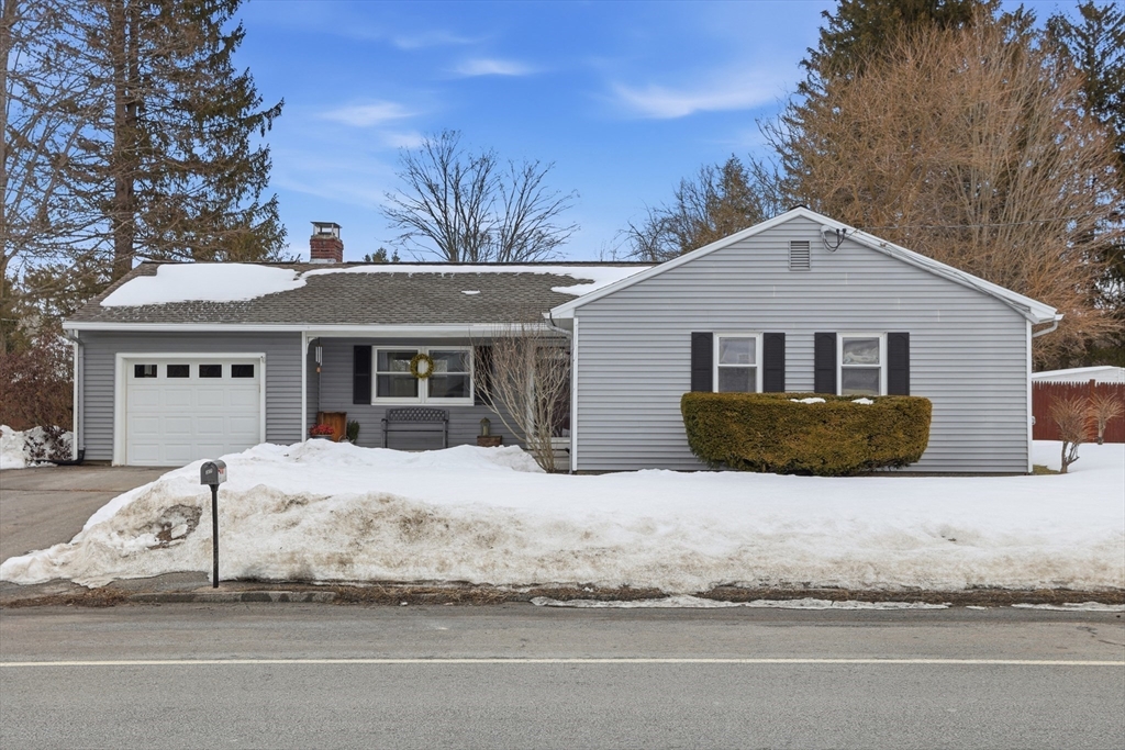 37 Sterling Street Lancaster, MA 01523 - Photo 1 of 33 a front view of a house with a yard