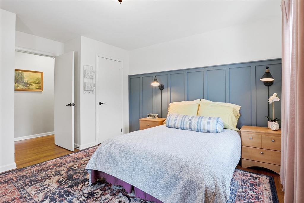 37 Sterling Street Lancaster, MA 01523 - Photo 15 of 33 a bedroom with a bed and wooden floor