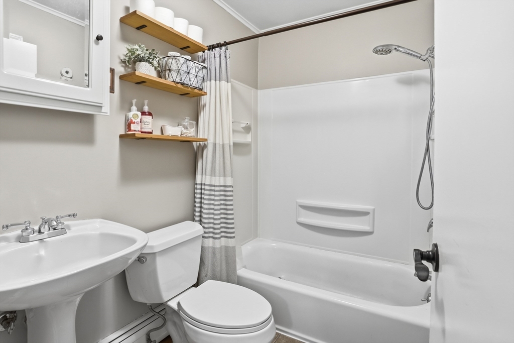 37 Sterling Street Lancaster, MA 01523 - Photo 17 of 33 a bathroom with a sink toilet and shower