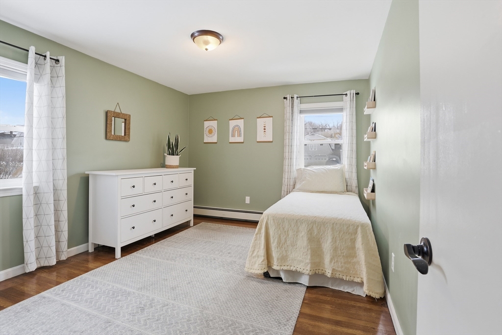 37 Sterling Street Lancaster, MA 01523 - Photo 18 of 33 a bedroom with a bed and a dresser