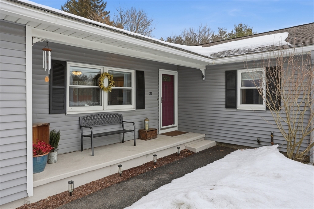 37 Sterling Street Lancaster, MA 01523 - Photo 2 of 33 a front view of a house with a porch