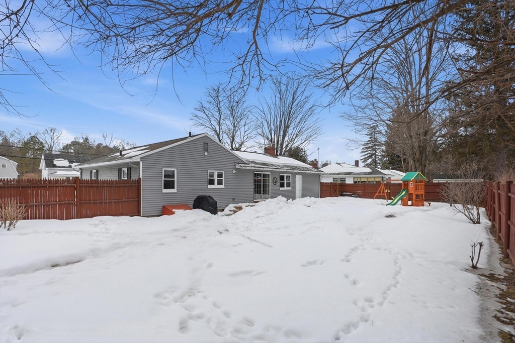 37 Sterling Street Lancaster, MA 01523 - Photo 27 of 33 a view of a house with a snow in a yard