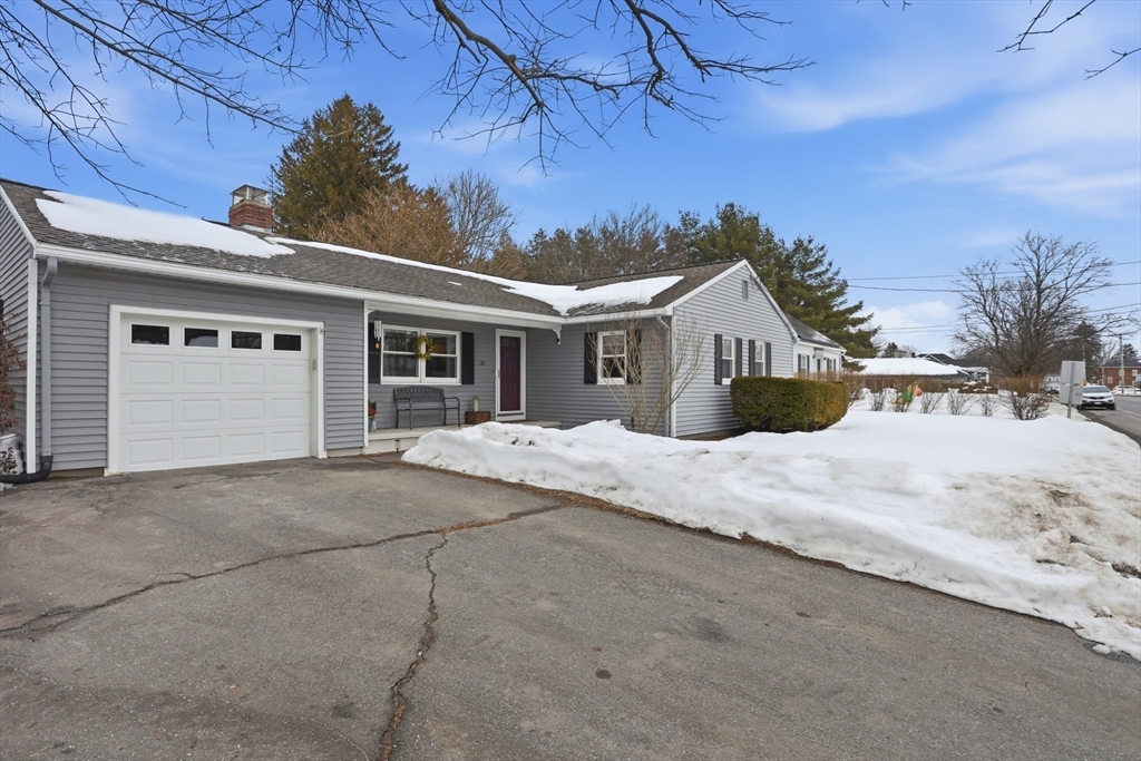 37 Sterling Street Lancaster, MA 01523 - Photo 28 of 33 a front view of a house with a yard