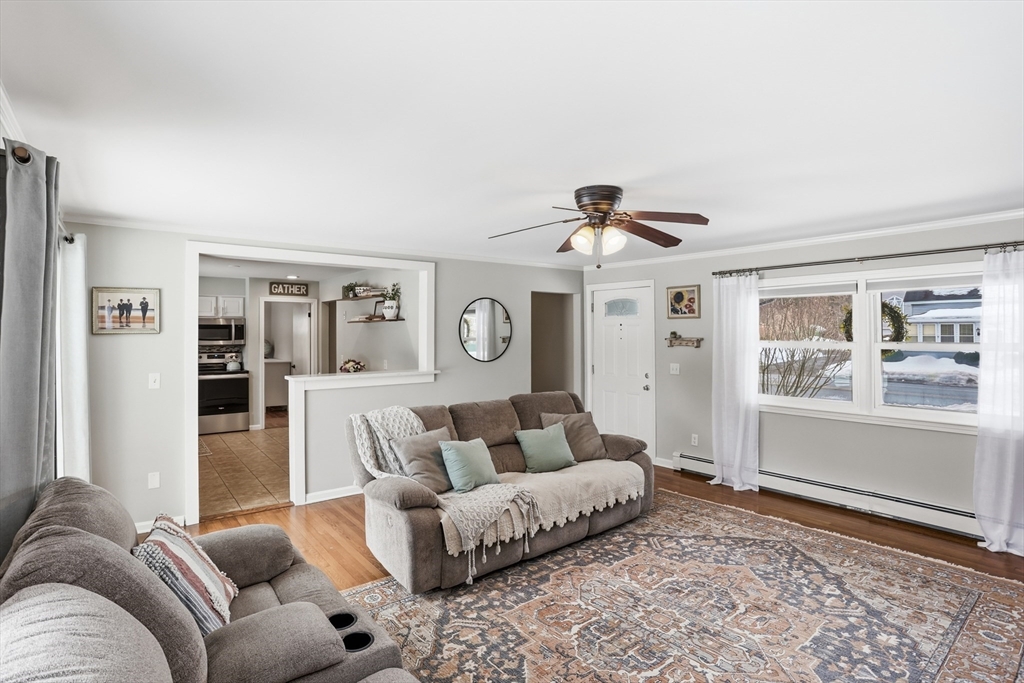 37 Sterling Street Lancaster, MA 01523 - Photo 6 of 33 a living room with furniture and a rug