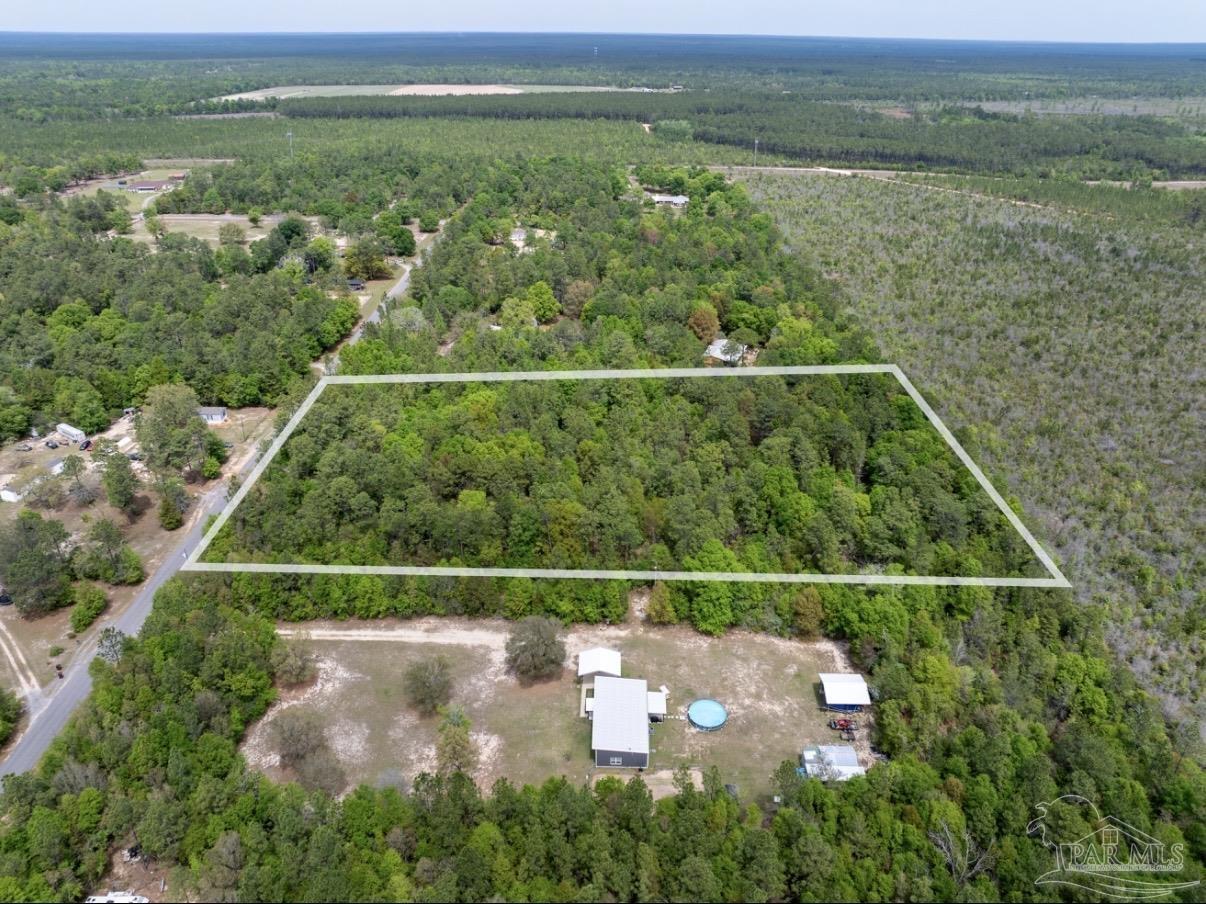 6512 Tracker Drive Milton, FL 32583 - Photo 11 of 18 a view of a yard with a lake view