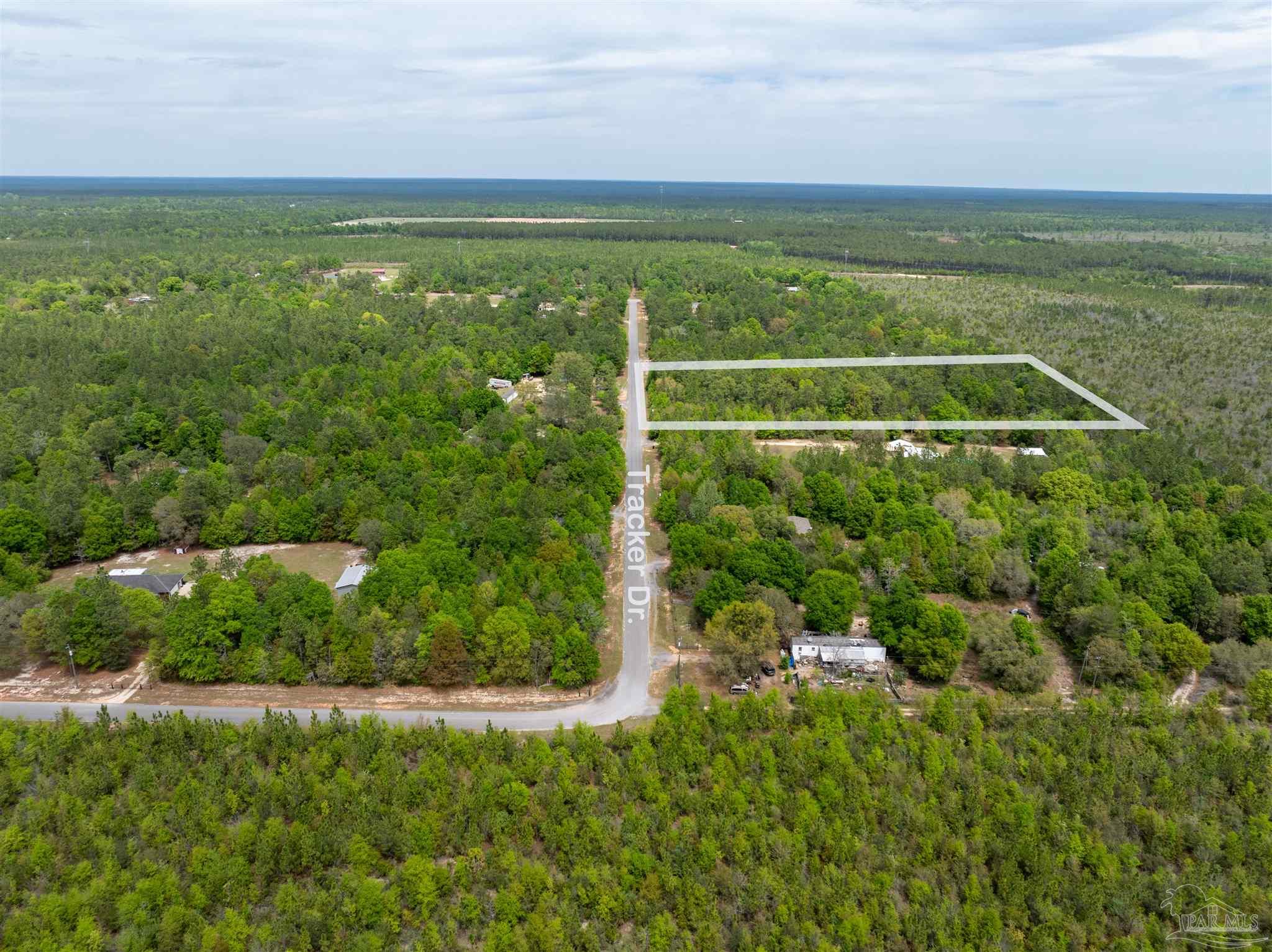 6512 Tracker Drive Milton, FL 32583 - Photo 12 of 18 a view of a field with an ocean view