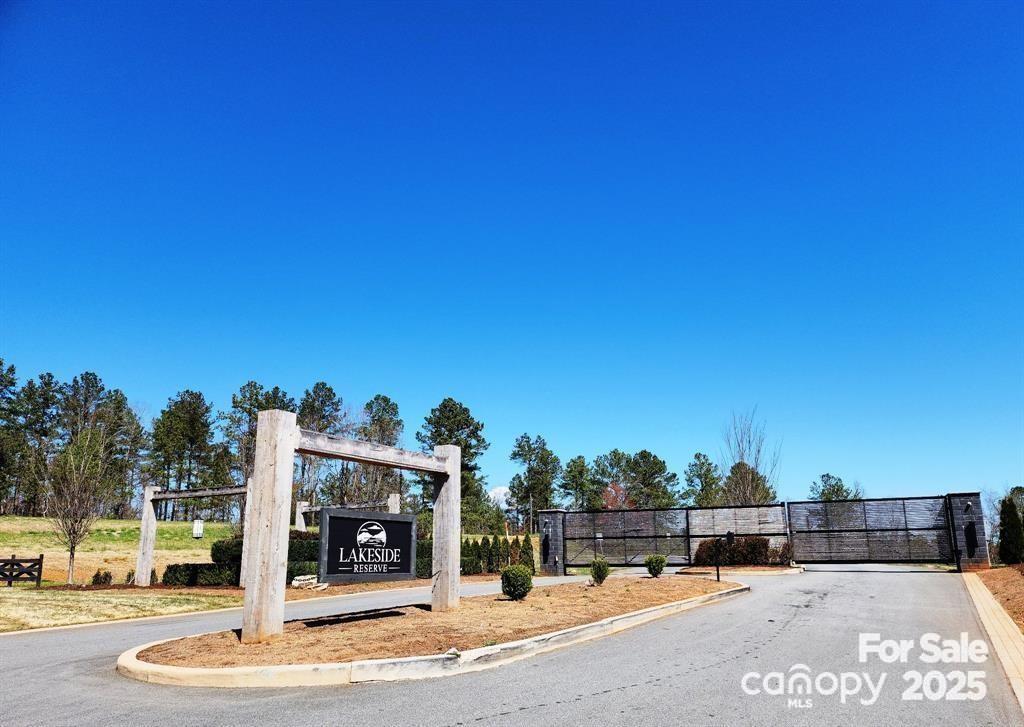 2242 Pikes Peak Ridge, Unit 159 Connelly Springs, NC 28612 - Photo 16 of 36 a outdoor space with lots of palm trees