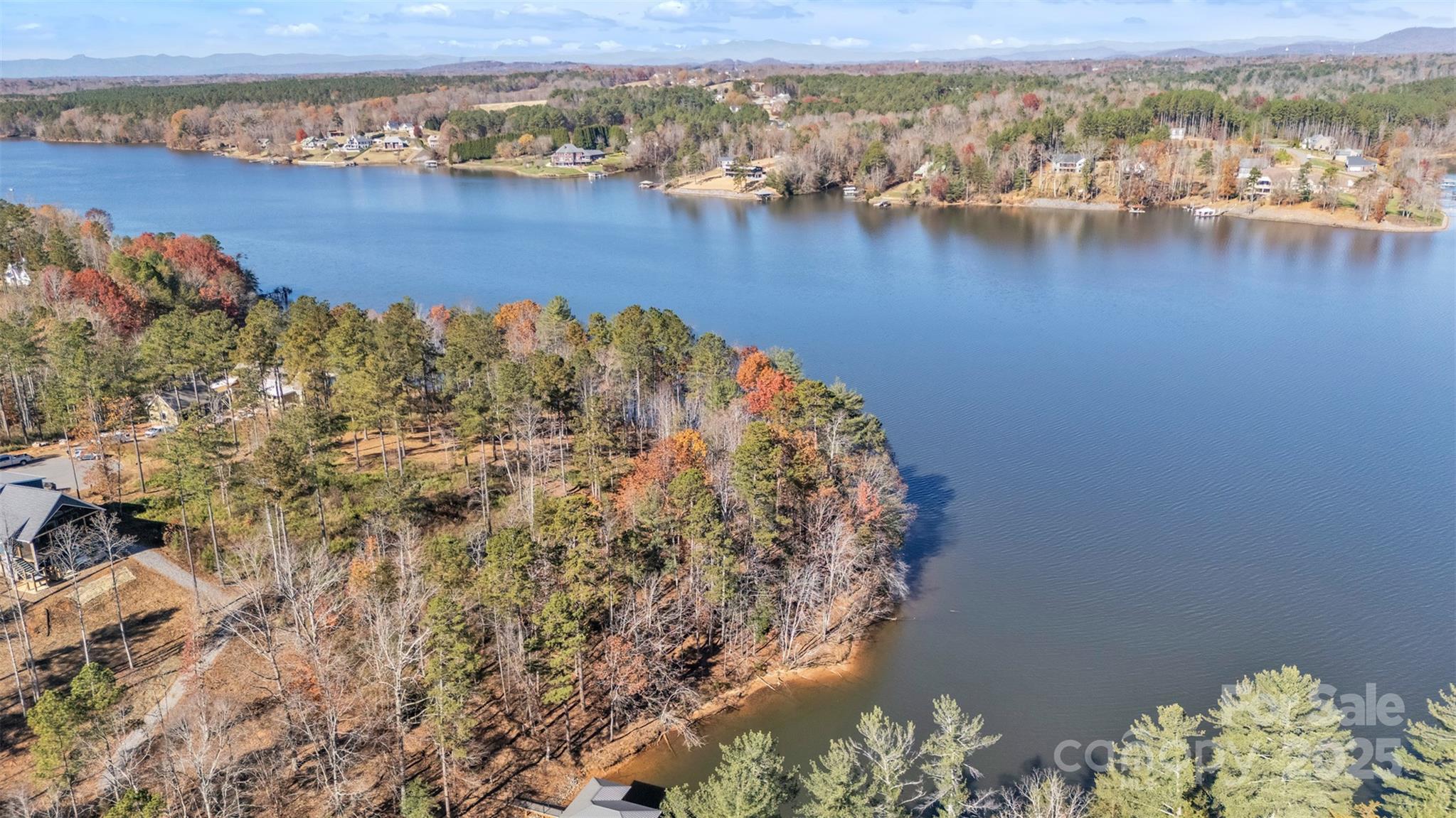 2242 Pikes Peak Ridge, Unit 159 Connelly Springs, NC 28612 - Photo 3 of 36 an aerial view of a houses with ocean view