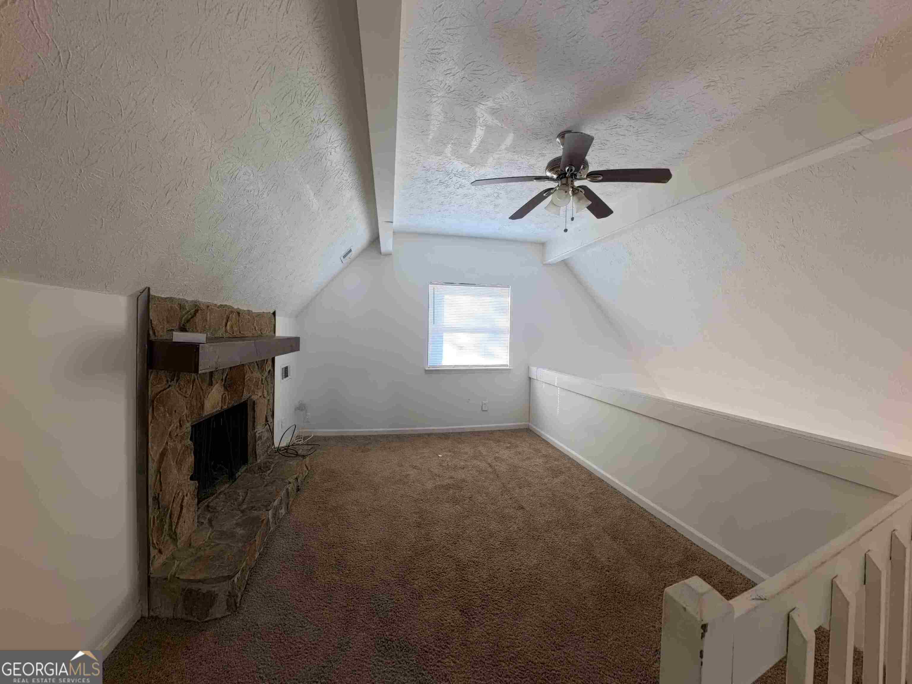 11187 Shannon Circle Hampton, GA 30228 - Photo 21 of 22 a view of a livingroom with a fireplace and a fan