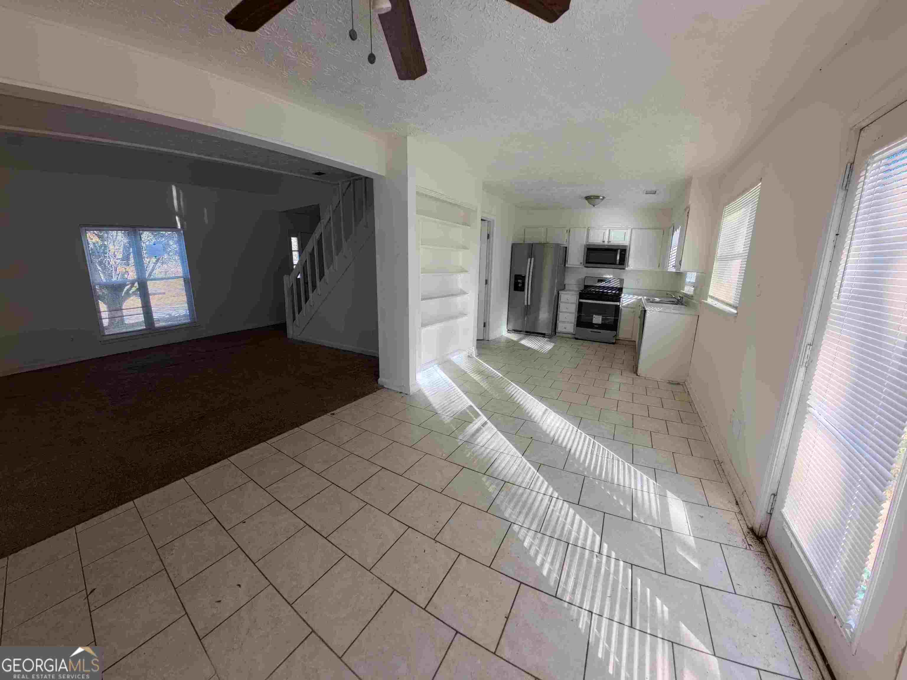 11187 Shannon Circle Hampton, GA 30228 - Photo 10 of 22 a view of a livingroom with furniture and window