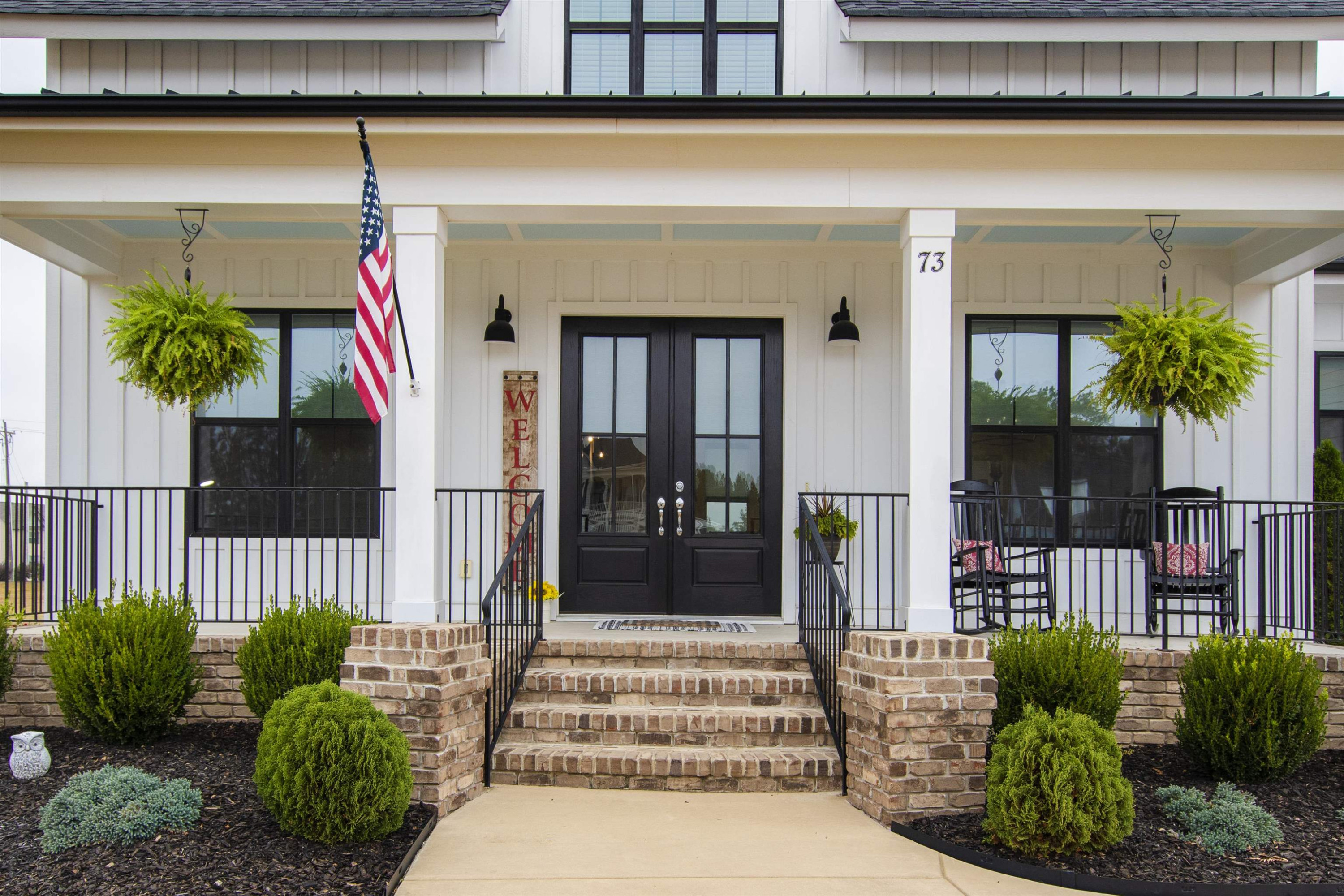 73 Constitution Avenue Smithfield, NC 27577 - Photo 13 of 66 a front view of a house with a porch