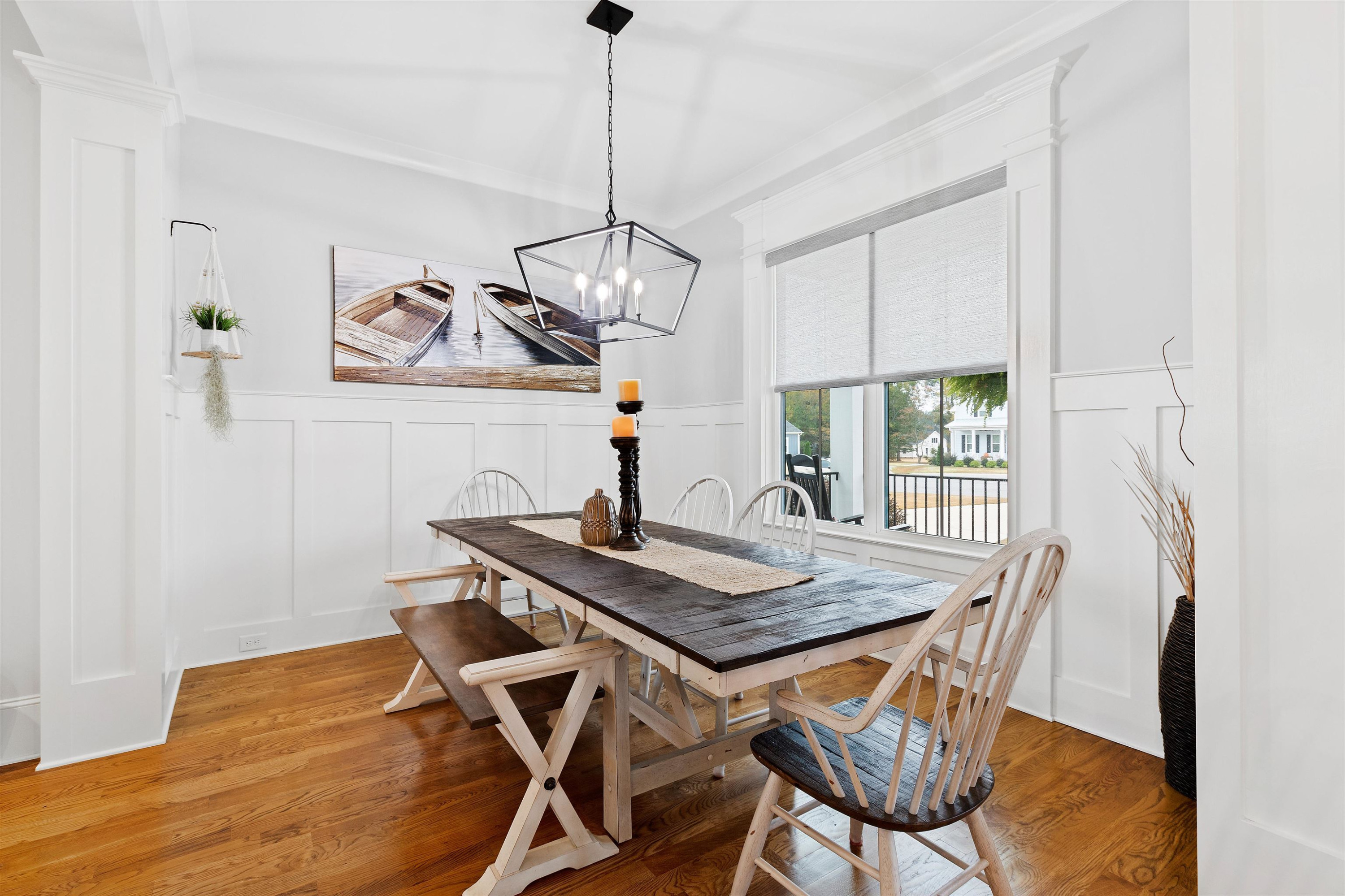 73 Constitution Avenue Smithfield, NC 27577 - Photo 20 of 66 a view of a dining room with furniture window and wooden floor