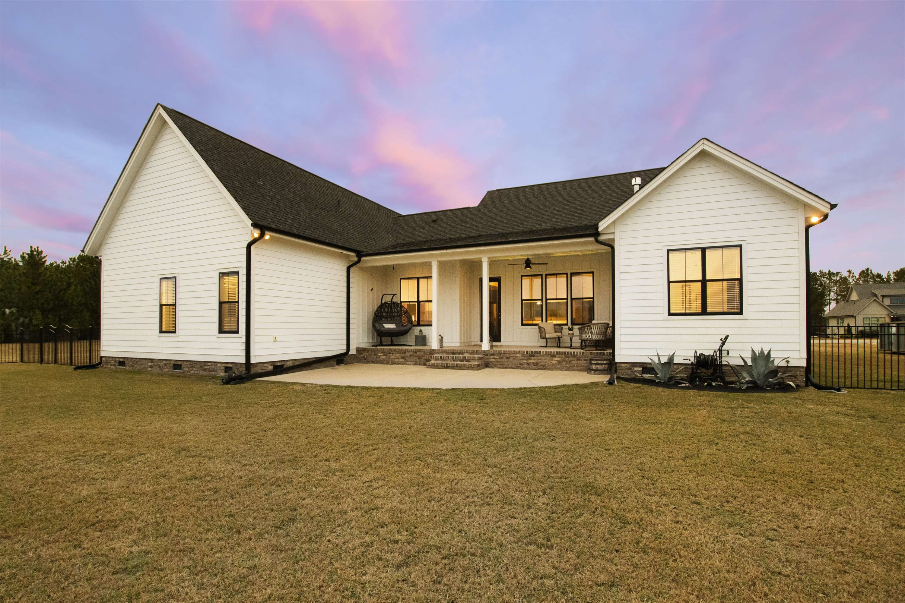 73 Constitution Avenue Smithfield, NC 27577 - Photo 2 of 66 a view of a house with swimming pool and a yard