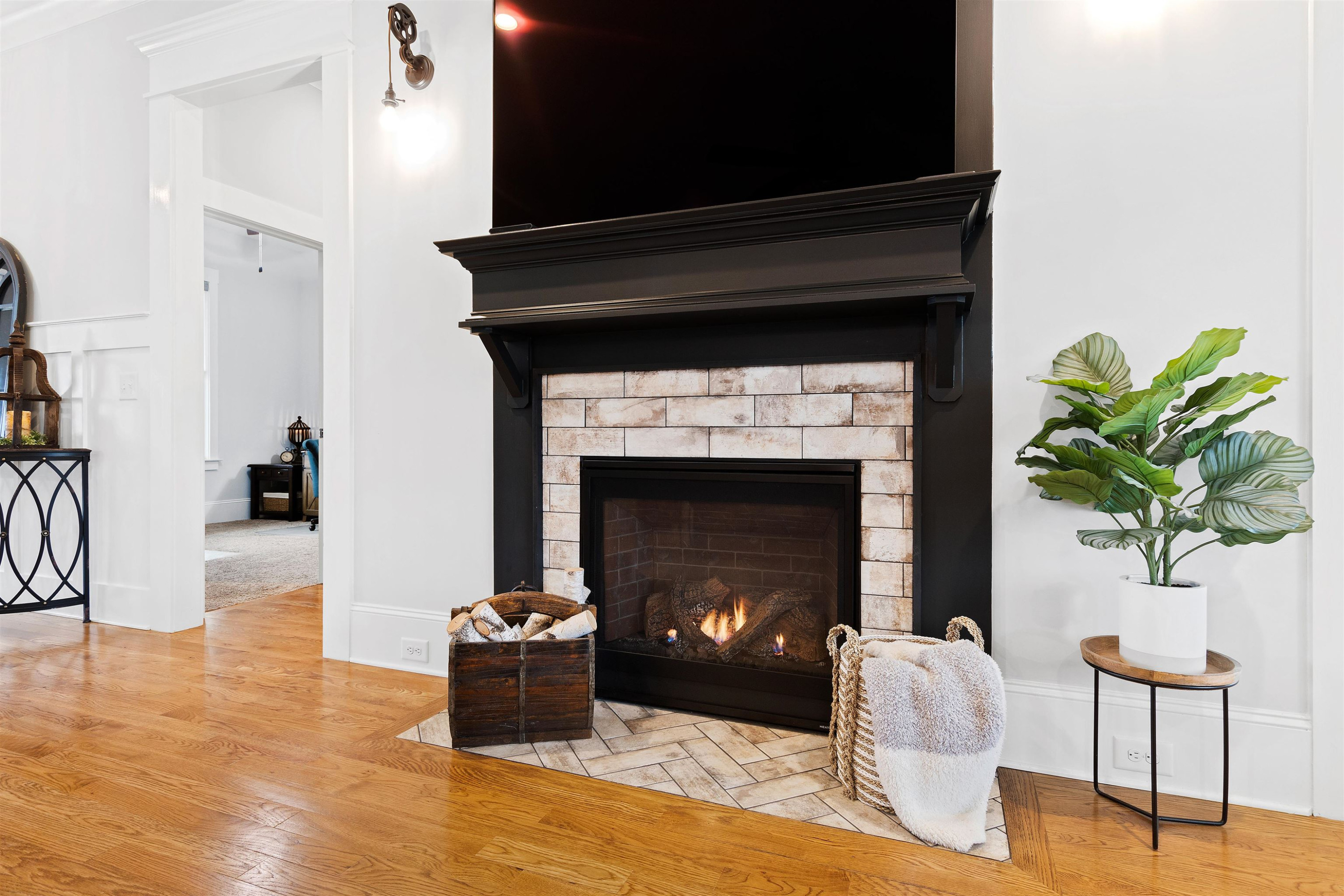 73 Constitution Avenue Smithfield, NC 27577 - Photo 23 of 66 a living room with furniture and a fireplace