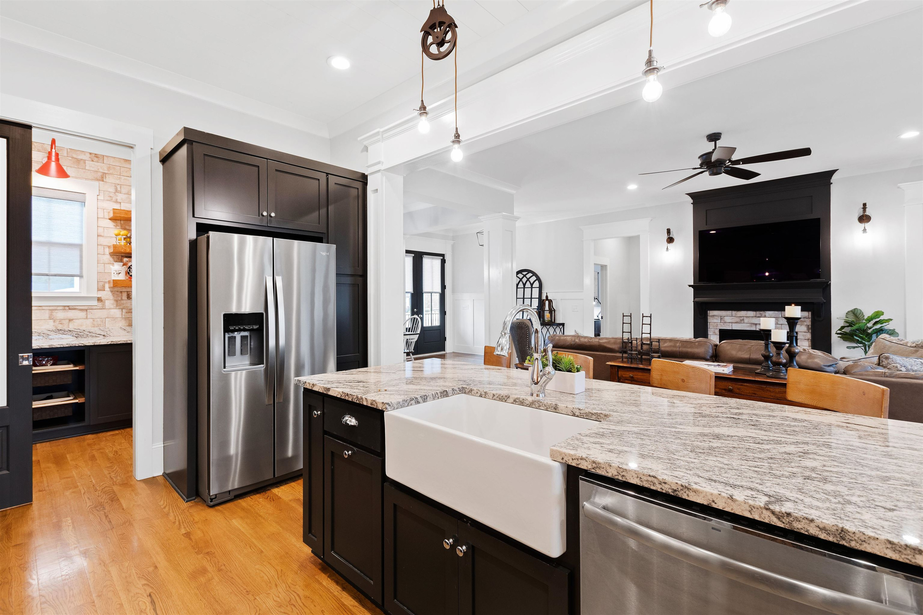 73 Constitution Avenue Smithfield, NC 27577 - Photo 28 of 66 a kitchen with stainless steel appliances granite countertop a sink a refrigerator and a stove
