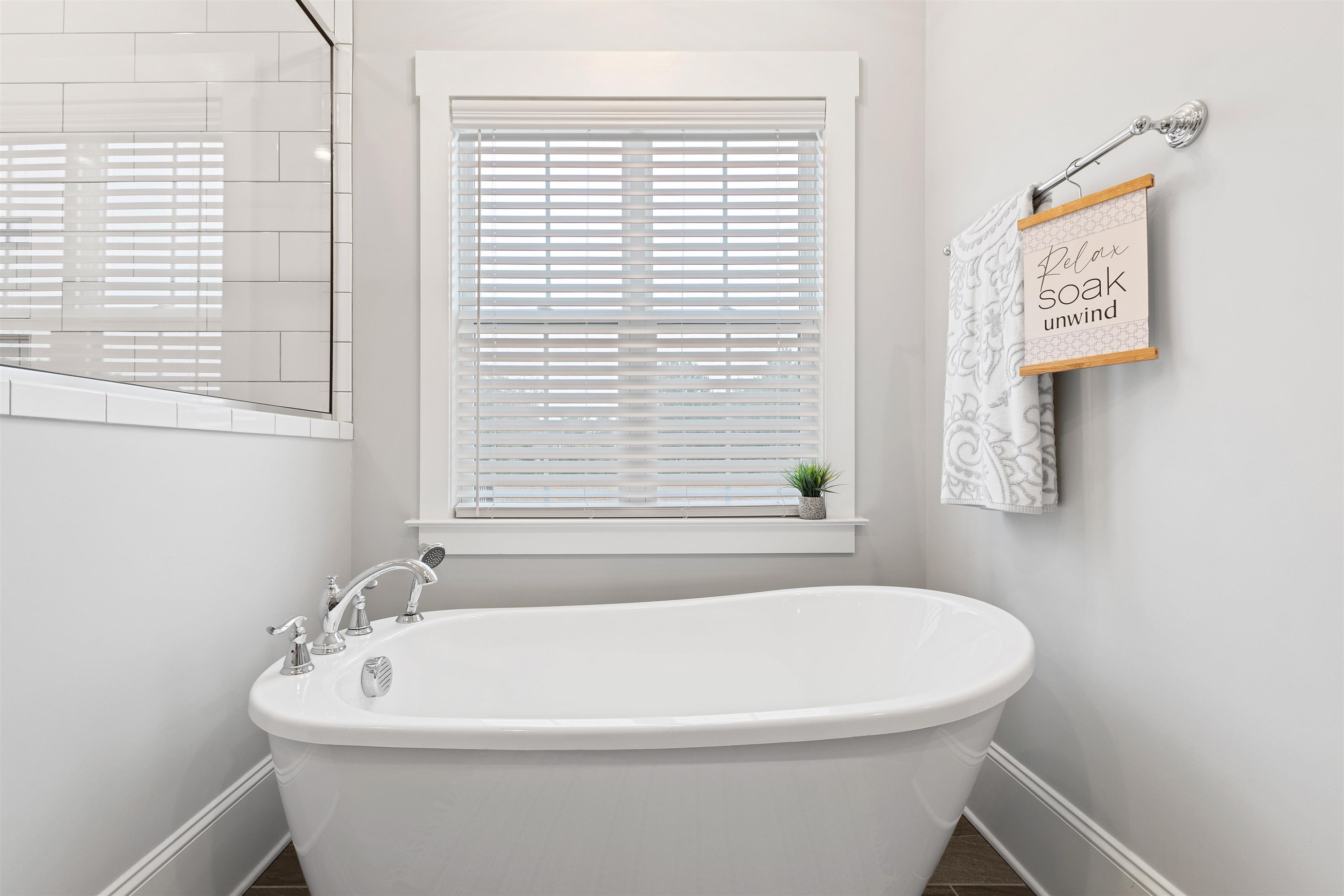 73 Constitution Avenue Smithfield, NC 27577 - Photo 38 of 66 a white bath tub sitting next to a white sink