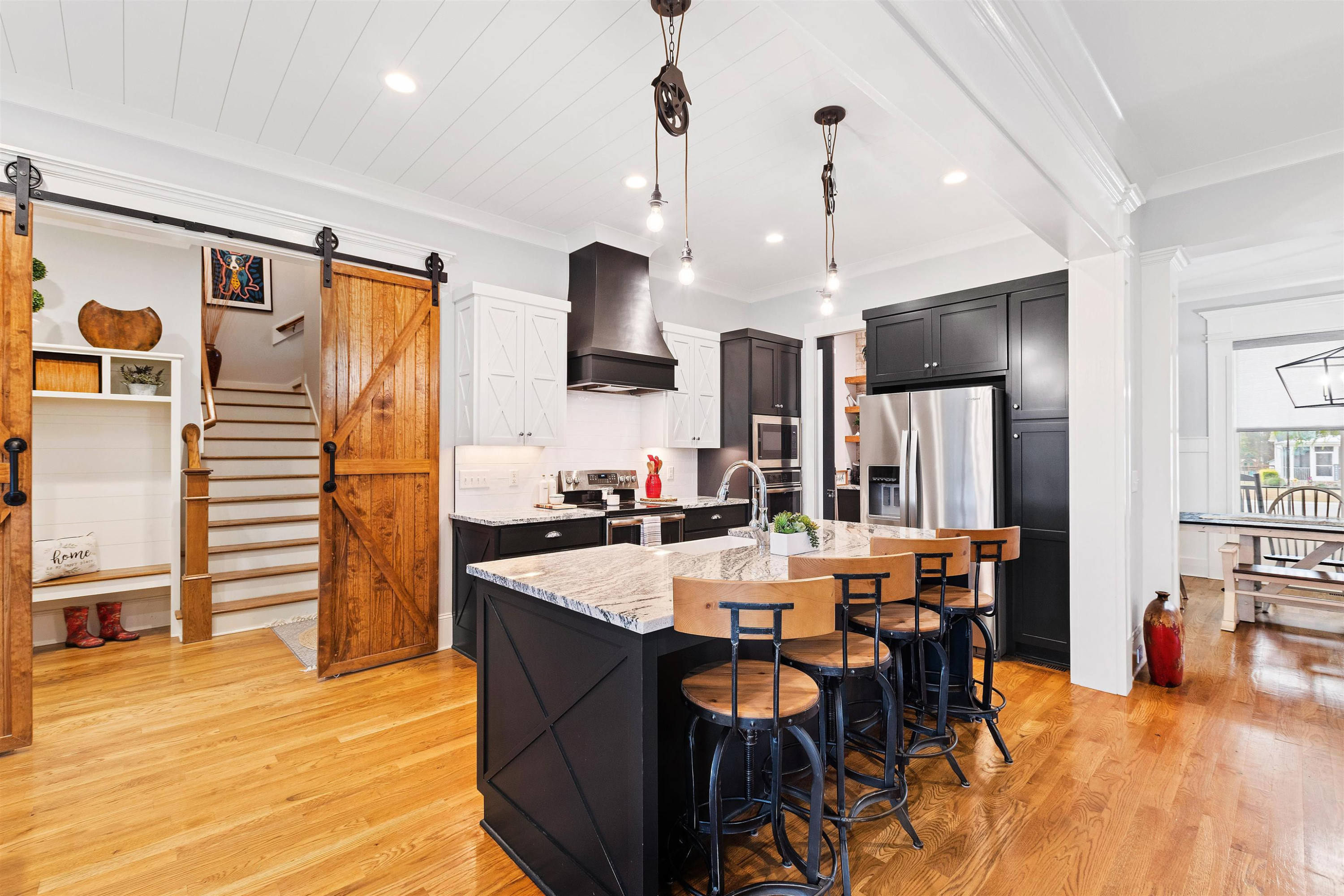 73 Constitution Avenue Smithfield, NC 27577 - Photo 4 of 66 a large kitchen with a table and chairs