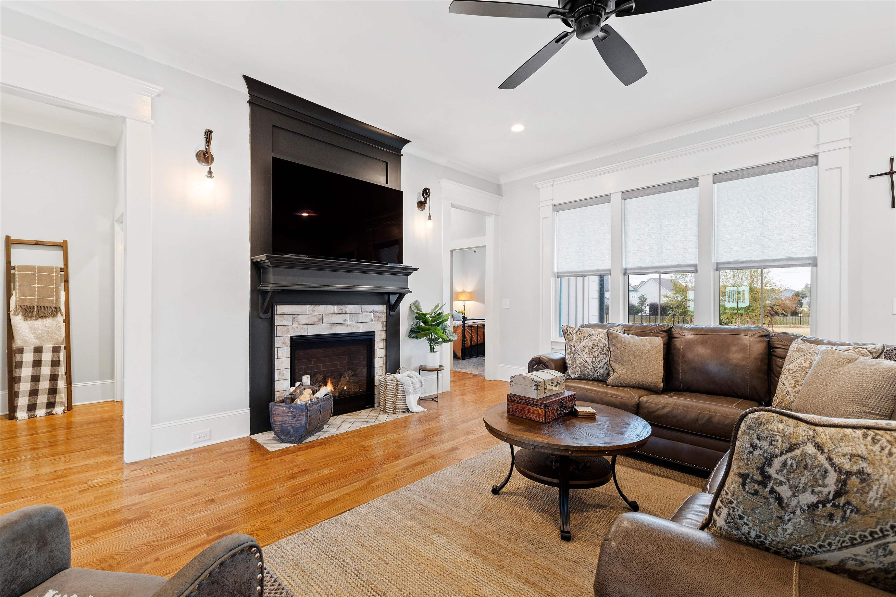 73 Constitution Avenue Smithfield, NC 27577 - Photo 7 of 66 a living room with furniture and a fireplace