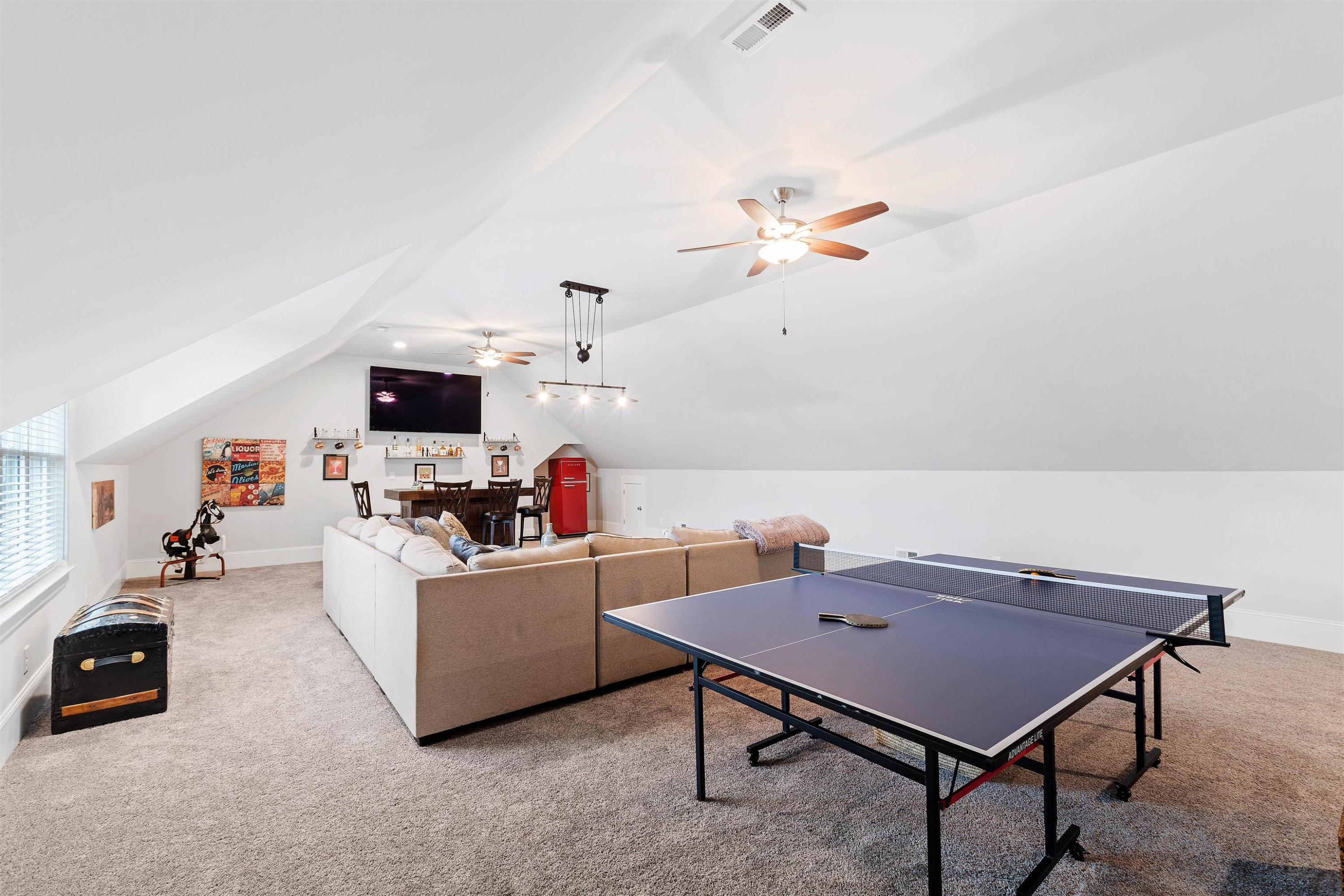 73 Constitution Avenue Smithfield, NC 27577 - Photo 9 of 66 a living room with furniture and a flat screen tv