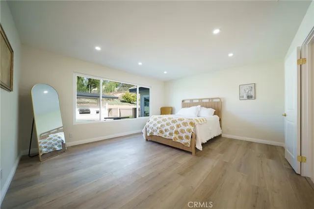 front view of a house with a large window