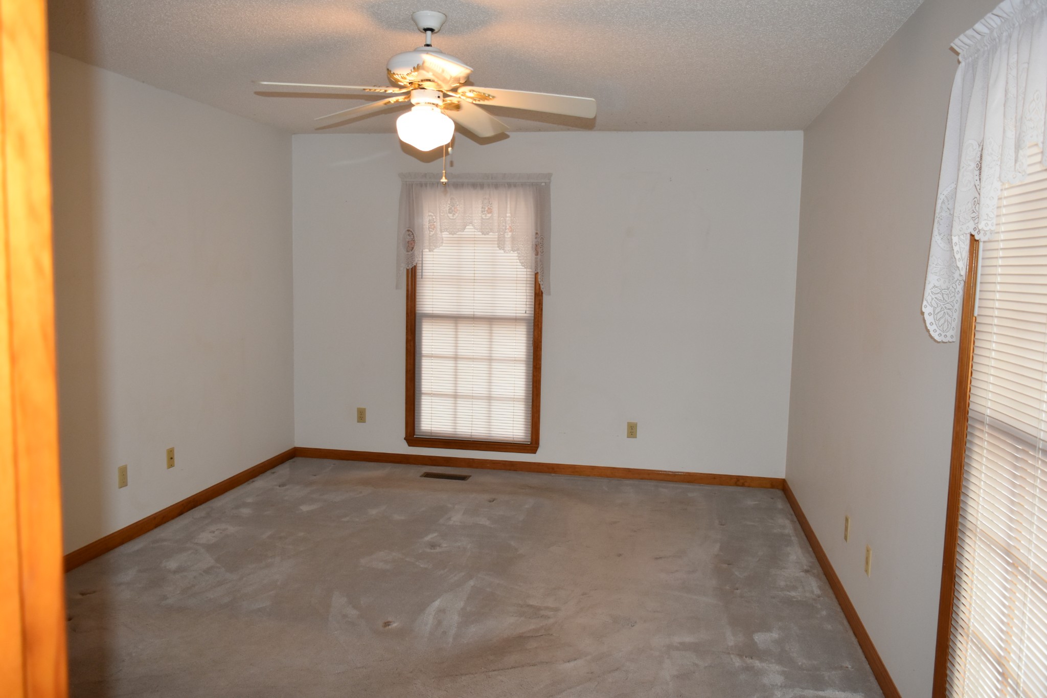 1454 Stagecoach Road Sewanee, TN 37375 - Photo 35 of 75 an empty room with windows and fan