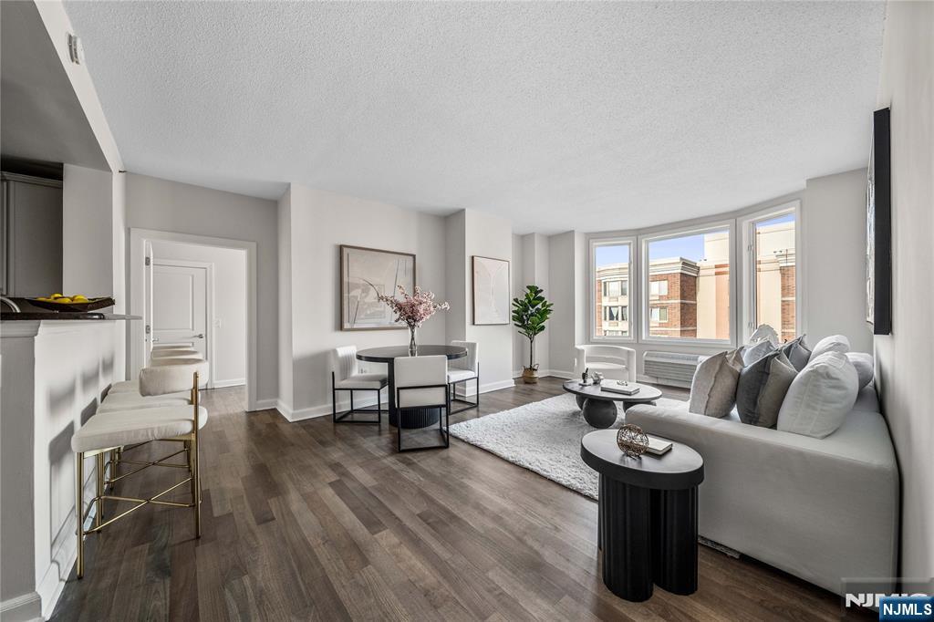 6404 City Place Edgewater, NJ 07020 - Photo 2 of 22 a living room with furniture and a table