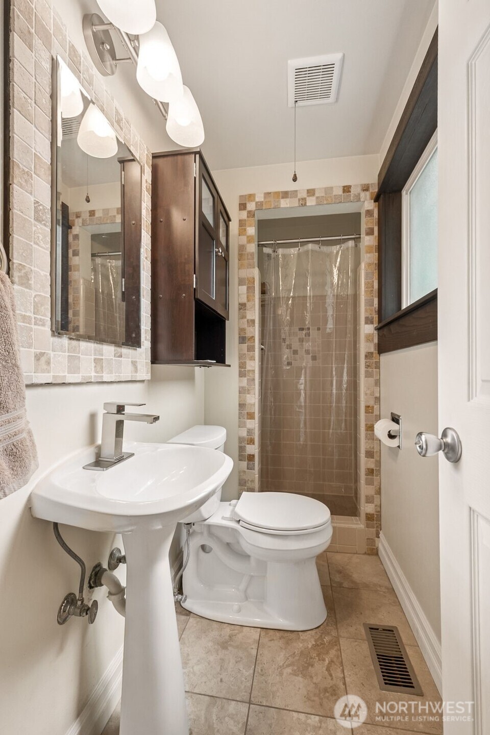 20623 98th Place South Kent, WA 98031 - Photo 14 of 37 a bathroom with a sink toilet and shower