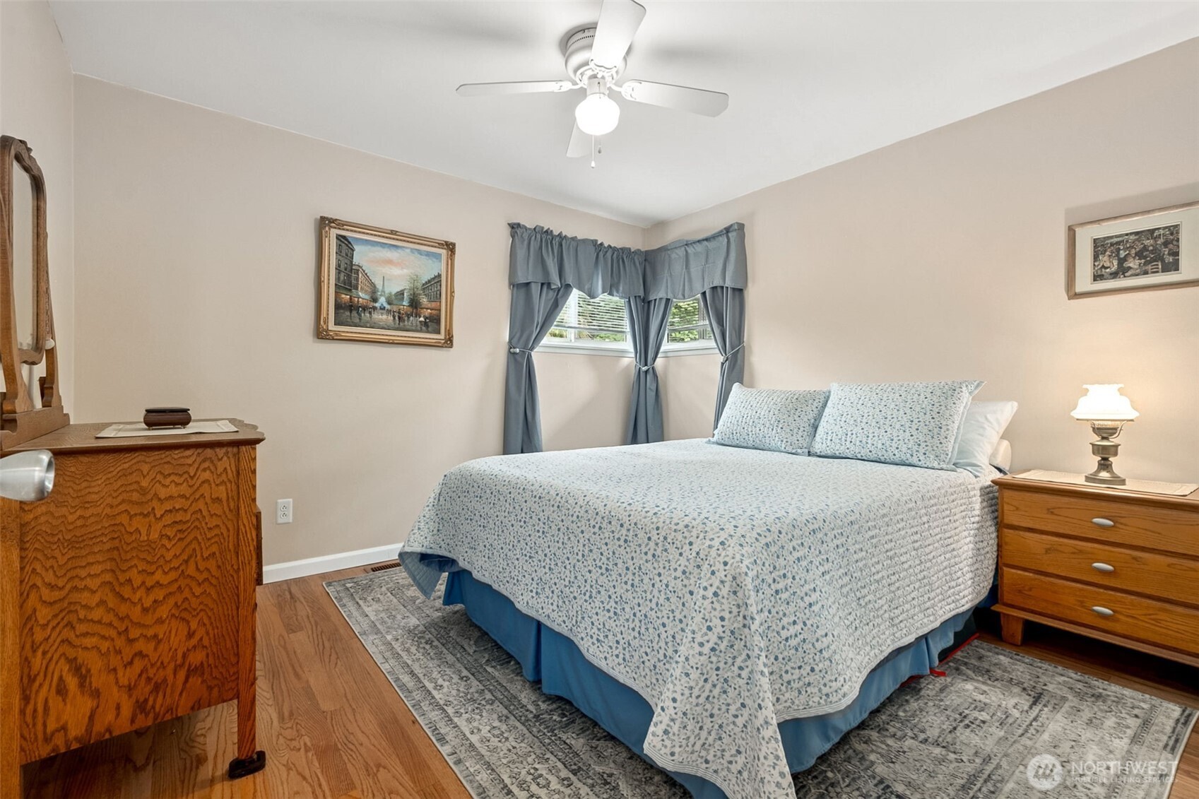 20623 98th Place South Kent, WA 98031 - Photo 15 of 37 a bedroom with a bed lamp and a window