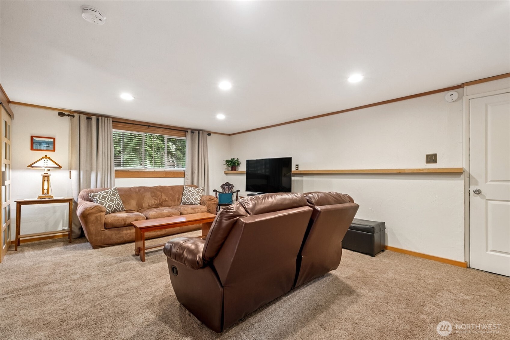 20623 98th Place South Kent, WA 98031 - Photo 18 of 37 a living room with furniture and a flat screen tv