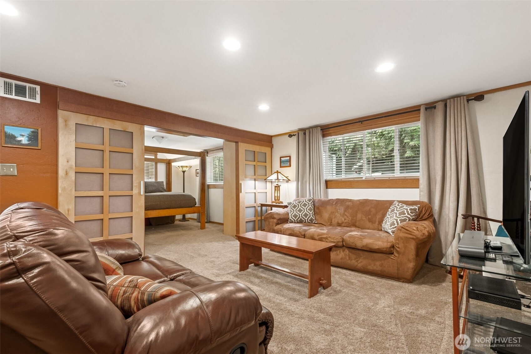 20623 98th Place South Kent, WA 98031 - Photo 19 of 37 a living room with furniture and a flat screen tv