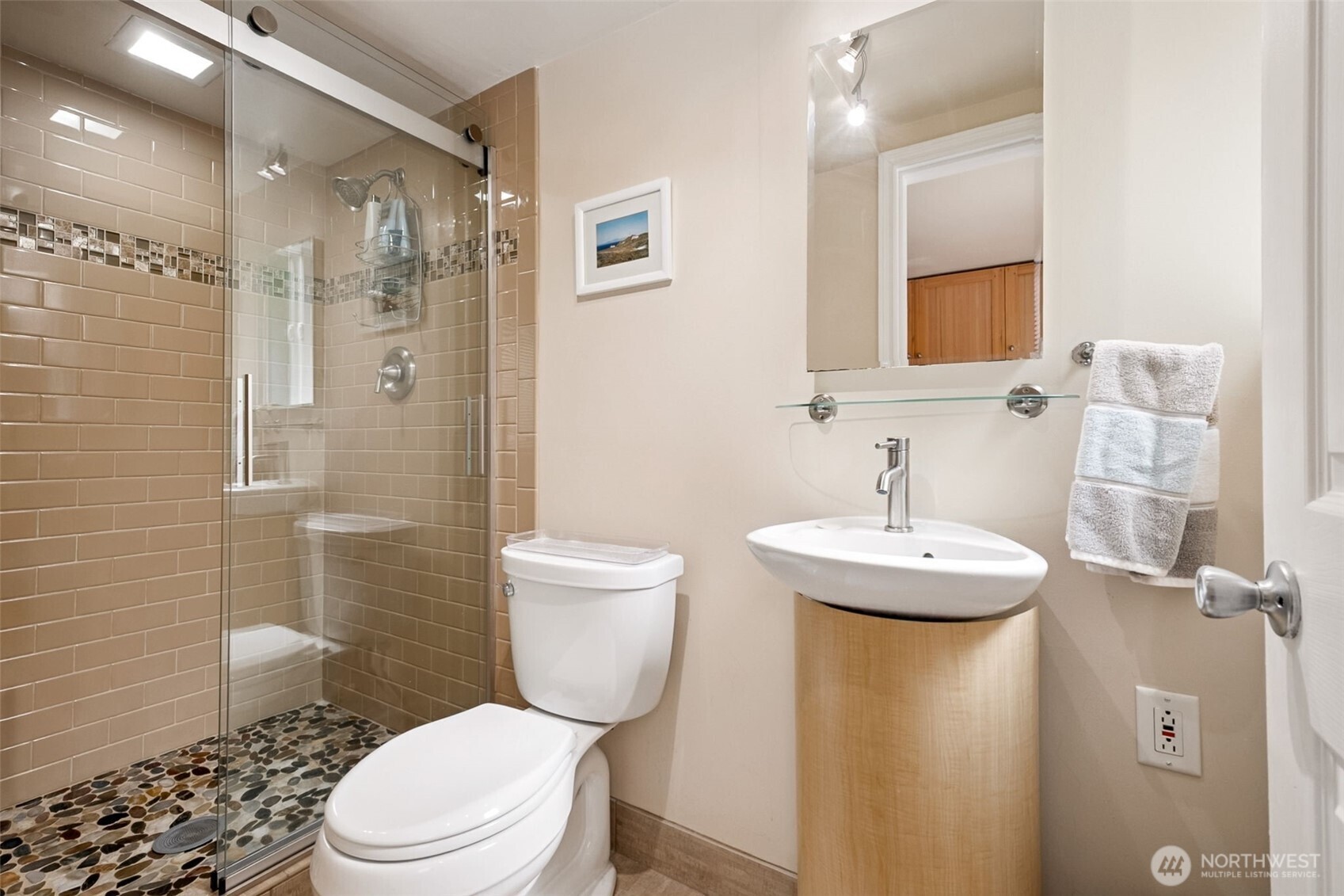 20623 98th Place South Kent, WA 98031 - Photo 21 of 37 a bathroom with a sink a toilet and shower